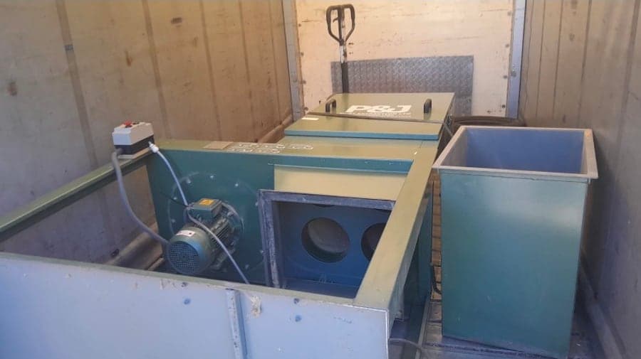 Commercial extraction equipment transported by Raymond Logistics